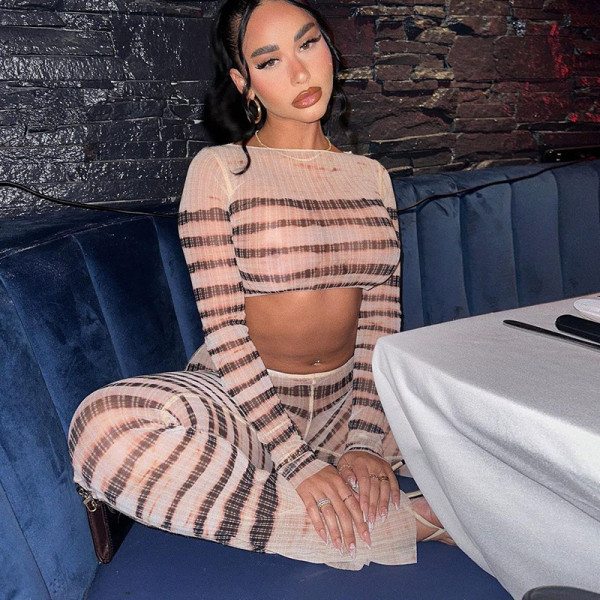 Striped navel exposed long sleeved top slim fitting long flared pants set