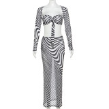 Long sleeved cardigan wrapped chest small vest half skirt three piece set