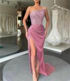 Long sleeveless fashionable jumpsuit with a mid length evening gown