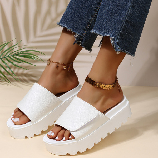 Solid color straight line thick sole sponge cake sole lightweight women's slippers