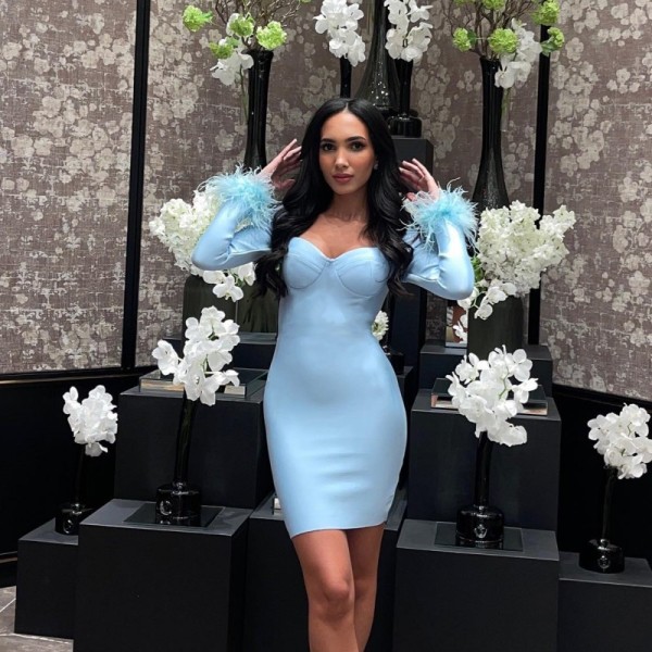 Solid color low cut long sleeved feather patchwork buttocks short dress