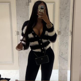 Black and white striped single breasted cardigan sweater