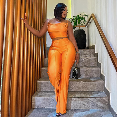Sleeveless camisole vest, high waisted wide leg pants, fashionable set