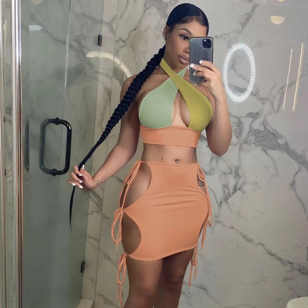 V-neck hollow lace up short skirt with patchwork color fashionable two-piece set
