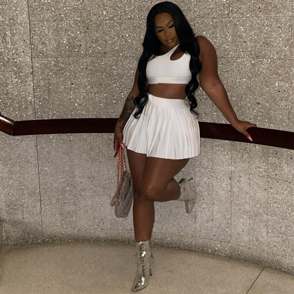 Waist exposed hollow pleated loose vest short skirt two-piece set