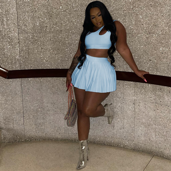 Waist exposed hollow pleated loose vest short skirt two-piece set