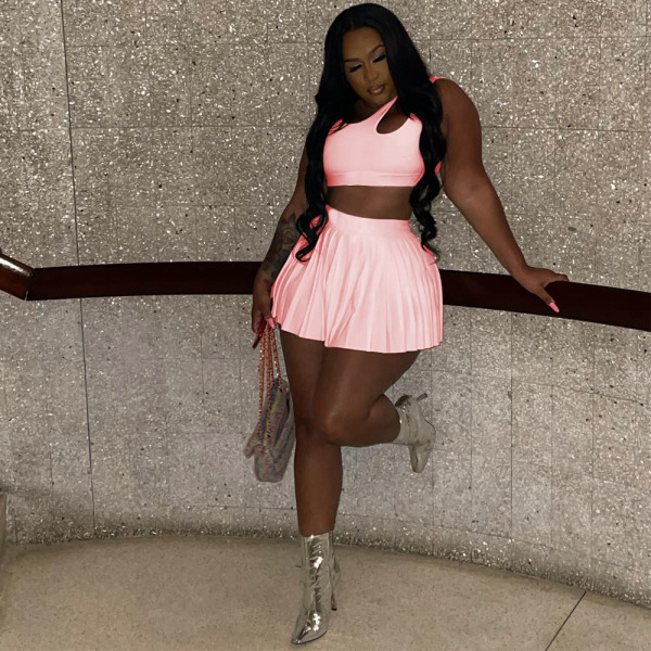 Waist exposed hollow pleated loose vest short skirt two-piece set