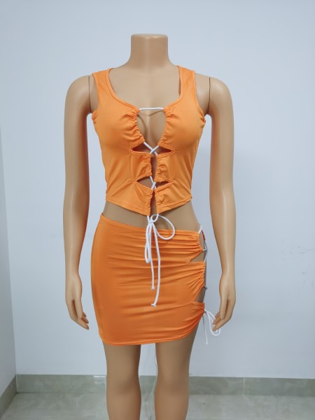 Solid color strap hollowed out two-piece set for oversized women's clothing