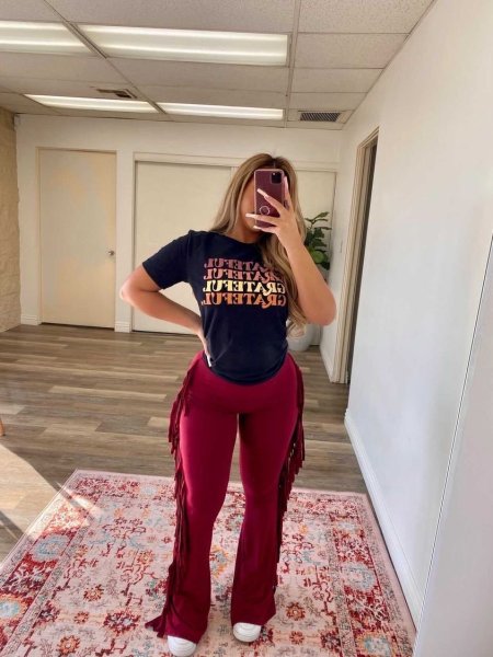Sexy slim fitting tassel buttocks flared pants