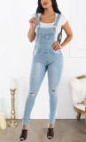 Perforated jeans with shoulder straps