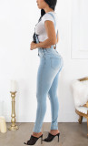 Perforated jeans with shoulder straps