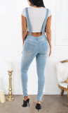 Perforated jeans with shoulder straps