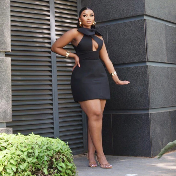 Sleeveless solid color short cut buttock wrapped hollow bow dress