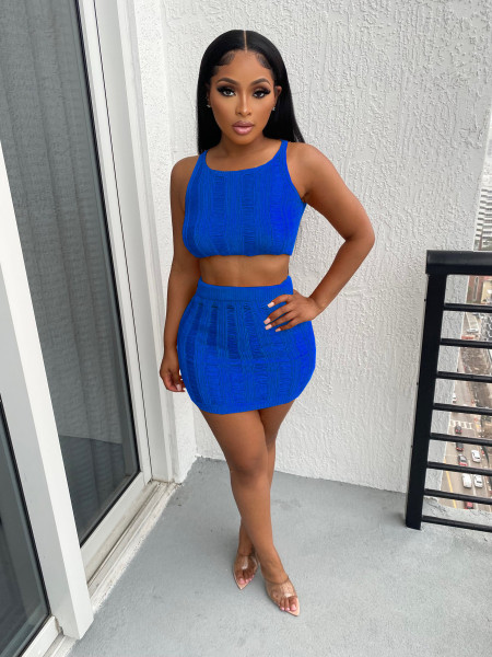 Knitted hollowed out vest and skirt two-piece set