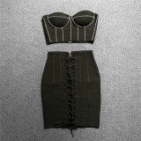 Wearing a strapless diamond studded top with drawstring bandages for a 2-piece dress set