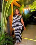 Women's one shoulder long sleeved split buttocks long skirt