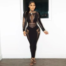 Round necked hollowed out long sleeved integrated knitted long buttocks wrapped dress
