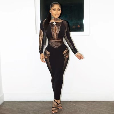 Round necked hollowed out long sleeved integrated knitted long buttocks wrapped dress