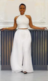 Two piece set of pleated sleeveless high waisted top and wide leg pants