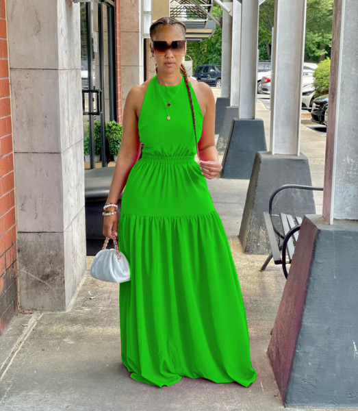 Women's dress with suspender and sleeveless sexy leaky back long skirt