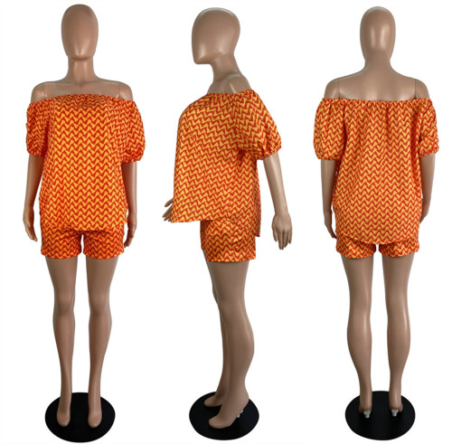 Two piece set of printed chest wrap and shorts