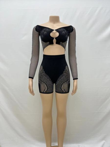 Double layer splicing long sleeved open navel top hollow shorts set