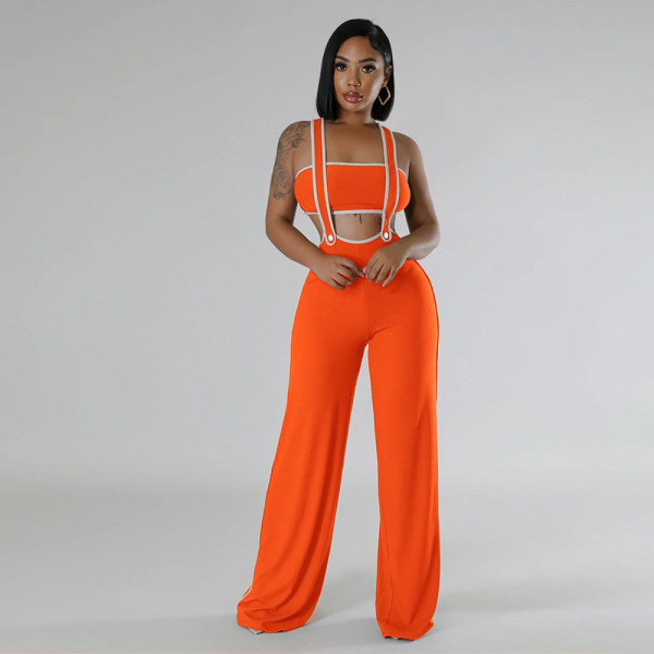 Loose camisole jumpsuit paired with strapless top