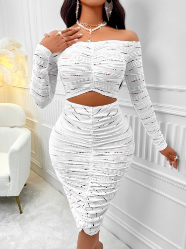 Solid color one shoulder long sleeved hollow dress