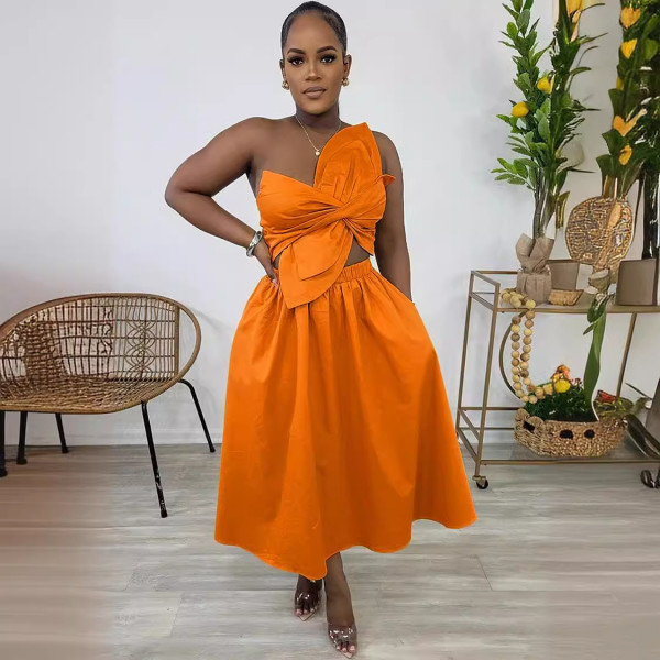 Solid color single shoulder petal hollow dress