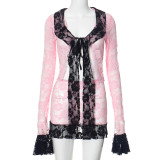 Splicing long sleeved top and skirt set
