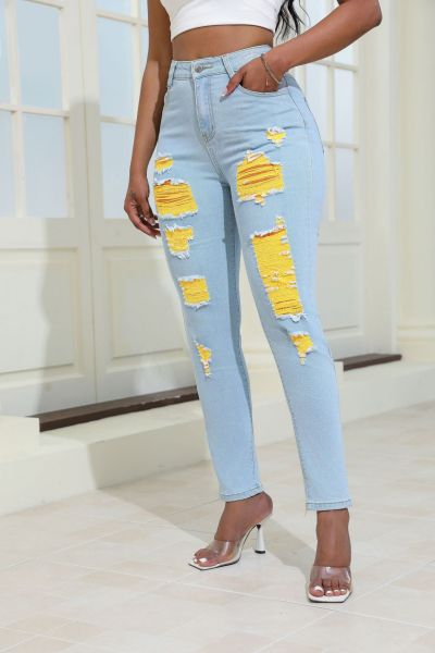 Light colored perforated elastic jeans
