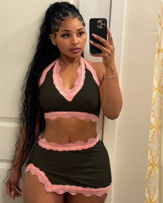 Two piece set of neck hanging V-neck vest and high waisted hip hugging half skirt