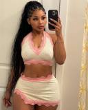 Two piece set of neck hanging V-neck vest and high waisted hip hugging half skirt