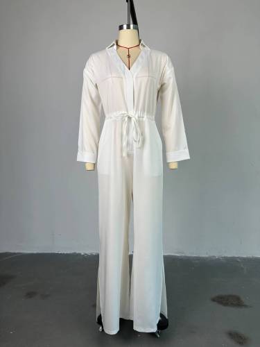 Solid color lapel long sleeved breasted waistband tie up wide leg jumpsuit