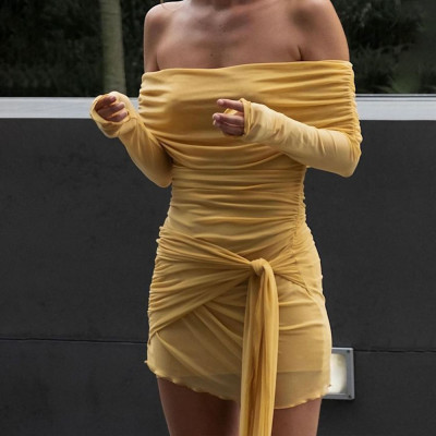 Skirt with strapless design, long sleeved, pleated, and hip hugging skirt