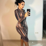 Long sleeved lapel style mid length skirt