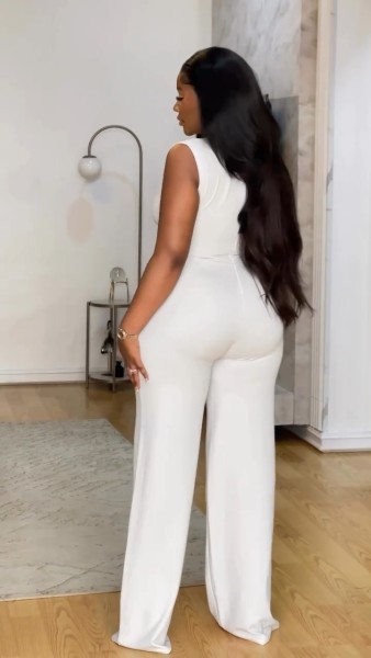 Sleeveless pleated wide leg jumpsuit