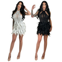 Sequined sleeveless hip hugging short skirt