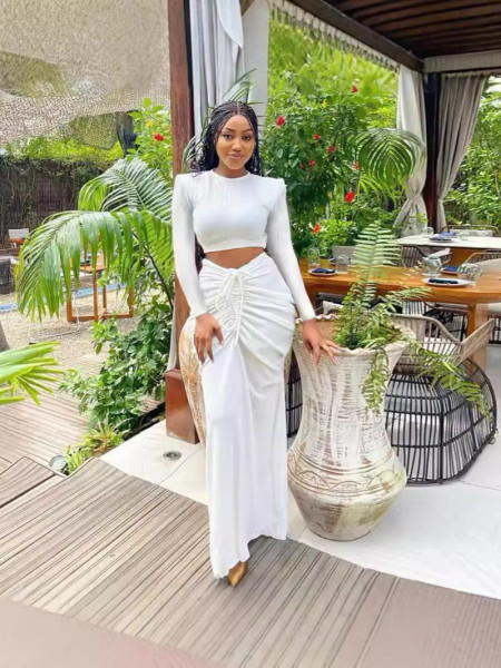 Women's long sleeved pleated waist revealing long skirt set