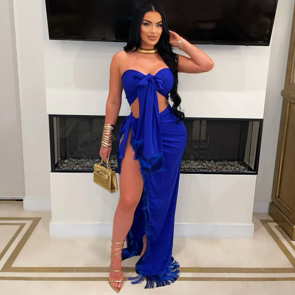 High slit tassel long skirt paired with strapless top and tie up two-piece set