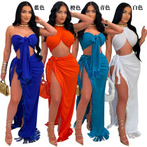 High slit tassel long skirt paired with strapless top and tie up two-piece set High slit tassel long skirt paired with strapless top and tie up two-piece set