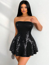 Sleeveless strapless waist cinching sequined dress