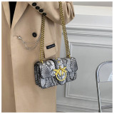 Contrasting snake patterned chain, armpit, shoulder, crossbody