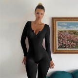 Women's V-neck breasted long sleeved, hip hugging solid color jumpsuit