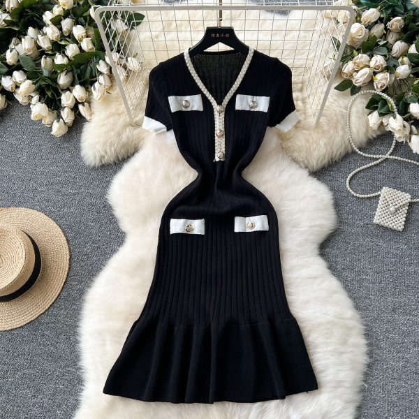 V-neck waist cinched short sleeved knitted dress