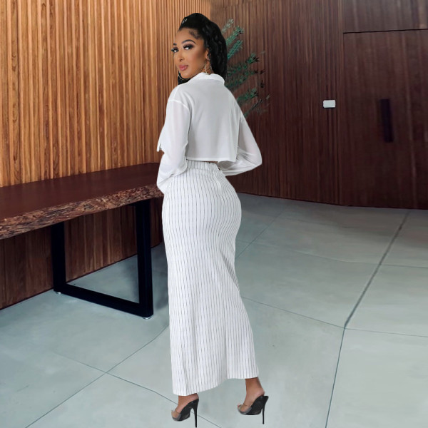 Women's shirt style with exposed navel, long sleeved top, elastic waist, half skirt set
