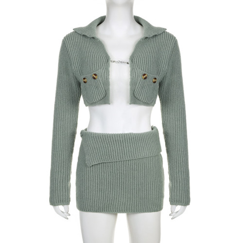 Two piece set of metal buckle lapel top and half skirt