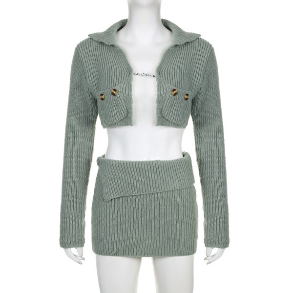 Two piece set of metal buckle lapel top and half skirt