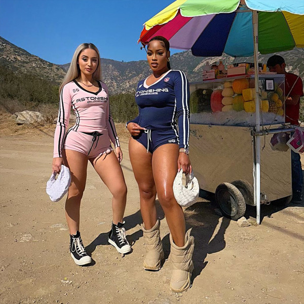 Printed long sleeved V-neck top with lace up shorts set