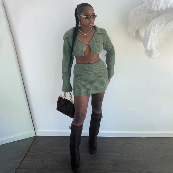 Two piece set of metal buckle lapel top and half skirt